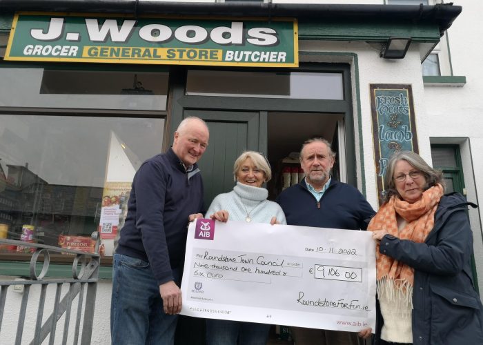 Des & Sissi Cullen handover the cheque on behalf of Roundstone For Fun 2022 to Seamus & Christina Lowry representing the Roundstone Community